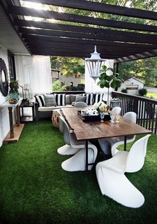 10 Ways to Use Rugs in Your Outdoor Space This Spring - Photo 4 of 10 - Drought or desert-scaping doesn't have to feature only succulents. For rooftop spaces, high-quality astroturf is low maintenance and a great grass replacement.