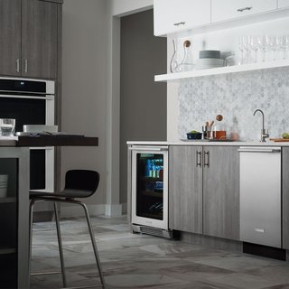 5 Modern Dishwashers - Photo 4 of 5 - With Energy Star certification and an annual run cost of only $31, the IQ-Touch is a worthwhile investment. Electrolux has also been able to maintain energy efficiency without lengthening the cycle run time, which clocks in at 113 minutes. Three adjustable racks and two spray arms are hidden behind a clean stainless-steel facade with a simple handle. 