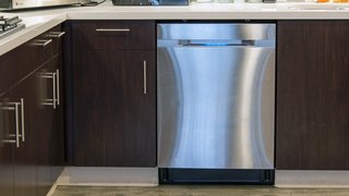 5 Modern Dishwashers - Photo 5 of 5 - Samsung’s WaterWall technology creates a wall of water that glides over dishes, but users can also customize wash settings based on different zones of the dishwasher to target specific items. The stainless-steel door features an LED display, and it remains in the realm of quieter models at 44 decibels. 