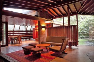 10 Modern Homes That Made a Star Appearance in Films - Photo 9 of 16 - Built with redwood, glass, red brick, and concrete, the house was originally designed by John Lautner for the Schaffer family, who used to spend time enjoying picnics under the resident oak trees. Lautner built the house horizontally around the oaks.