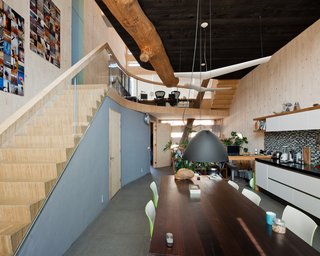 A Passive House in the Netherlands Embodies 5 Tips to Consider When Planning Your Own - Photo 4 of 5 - The dining and kitchen area are located on the first floor. The ceramic tile is from a local source, which is Cradle to Cradle certified.