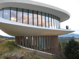 10 Modern Homes That Made a Star Appearance in Films - Photo 8 of 16 - Designed by Charles Deaton and completed in 1965, the Sculptured House is listed on the National Register of Historic Places and can be seen clearly from Interstate 70. 
