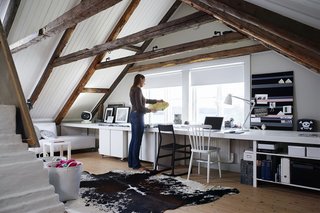 10 Ways to Create a Modern Workspace in Your Attic - Photo 5 of 10 - The monochromatic color palette of this Portuguese home office creates a cohesive look and draws your attention to natural elements used in the architectural details of the space.