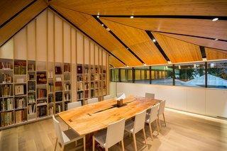 Take a Tour of Kengo Kuma’s Expansion of the Portland Japanese Garden - Photo 3 of 8 - The collection of Japanese garden and cultural books is housed in the Vollum library. A custom-made George Nakashima table sits in the foreground. 