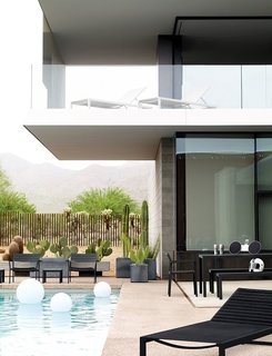 Extend Your Time Outside With These 6 Innovative Lighting Designs For Your Outdoor Space - Photo 2 of 5 - The wireless and rechargeable Globe Portable LED Lamps have no problem floating in the pool. You can choose from three modes—static in white, red, blue or green; a candle effect; or unlimited colors that change automatically.