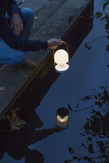 Extend Your Time Outside With These 6 Innovative Lighting Designs For Your Outdoor Space - Photo 3 of 5 - Inma Bermúdez designed this portable, lightweight, and rechargeable light for locations with limited access to electrical outlets. It boasts a quirky shape that’s both endearing and comfortable to carry around.