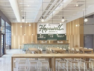 10 Brewpubs That Have Tapped the Art of Modern Design - Photo 4 of 12 - Founders Samantha Lee, Stephen Bossu, and Jonathan Fritz worked with RANGE Design to lead the design and architecture of the space—along with Navillus Woodworks, who fabricated the custom finishes and furniture. Much of the branding design was done in collaboration with Official Mfg. Co. (OMFG Co.) out of Portland, Oregon.