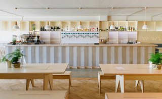 10 Brewpubs That Have Tapped the Art of Modern Design - Photo 2 of 12 - Fleet Architects used light wood to contrast with the building's concrete exterior. They custom-made the birch-plywood furniture and the wooden panels that cover the bar. 