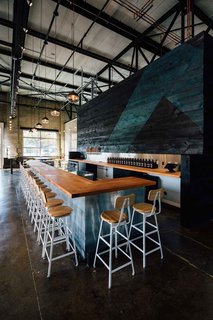10 Brewpubs That Have Tapped the Art of Modern Design - Photo 8 of 12 - To outfit the 10,000-square-foot factory space, Hank Butitta worked with local materials and manufacturers. He framed original elements of the building with simple forms while focusing on the power of its negative spaces.
