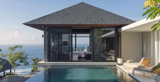 Perched atop a cliff, Villa Hamsa is a four-bedroom, fully staffed villa in the southernmost section of Bali’s Bukit Peninsula. It has generous dining spaces, a large infinity pool, and its own gym and massage room.