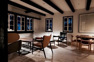 Furnished entirely with pieces by Bauhaus-era Danish designer Finn Juhl, House of Finn Juhl in the small Japanese town of Hakuba, Nagano, features a pared-down elegance that complements its alpine surroundings.