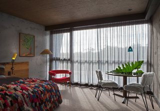 9 Small Spaces With Color - Photo 7 of 9 - Hotel Hotel in Canberra, Australia, was designed by Sydney-based filmmaker Don Cameron, who used restored 20th-century furnishings and bespoke joinery made with reclaimed oak to create interesting guest rooms.