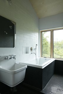 Hot to Trot - Photo 10 of 11 - In the bathroom, the sink is by Kohler and the tub is by Maax. 