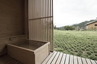Hide Out in One of These Asian Retreats That Are Immersed in Nature - Photo 1 of 12 - A two-hour ride on a high-speed train from Tokyo will take you to Satoyama Jujo in Minami-Uonuma. An open-air bathtub allows you to literally immerse yourself in nature.