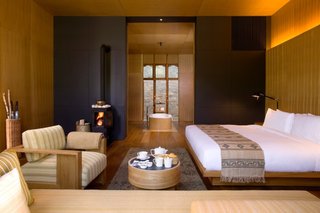 Hide Out in One of These Asian Retreats That Are Immersed in Nature - Photo 9 of 12 - Consistently ranked one of the world’s happiest country, Bhutan is endowed with natural beauty. Take in as much as you can during your visit with a stay at the five Amankora Lodges, which all come with cozy, modern interiors and expansive windows that take advantage of the views.