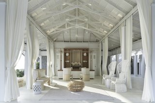 Hide Out in One of These Asian Retreats That Are Immersed in Nature - Photo 11 of 12 - A palette of white, blue, and gray bring a breezy, tropical, nautical look to Cape Kudu Hotel on the peaceful island paradise of Koh Yao Noi in Thailand.