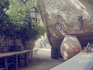 Mine Dining - Photo 3 of 18 - The Maurons have occupied the quarry outside Saint-Rémy-de-Provence for more than 400 years. It was Lolo and his late father who had the idea to turn the caves into a reservation-only table d’hôte and dish up old family recipes. 