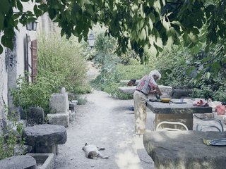Mine Dining - Photo 6 of 18 - He is fond of telling the story of a large stone table he bought from an antique dealer. When the deliveryman arrived, his truck couldn’t fit through the gate, so Lolo hauled the table into the courtyard himself, inching it into place over several days.