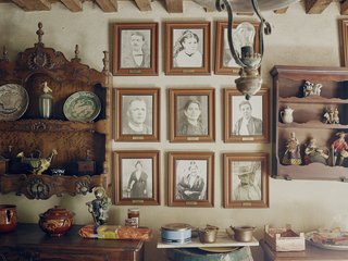 Mine Dining - Photo 8 of 18 - A wall of portraits pays tribute to Lolo’s ancestors. "All the men in my father’s family were called Joseph Honoré," he says, "but my mother wanted to call me Laurent, after her brother." The family tradition prevailed, but his mother insisted on calling him Lolo (pronounced Lu-lu).