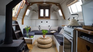 Make Yourself at Home in One of These Small Spaces on Boats That You Can Rent - Photo 9 of 10 - Spend the night on this steampunk-meets-cottage canal boat, and rise to the sounds of birdsong on London's River Thames.