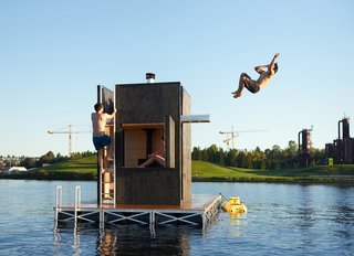 Escape to One of These 10 Otherworldly Outdoor Saunas - Photo 1 of 10 - Bathers can easily exit the structure and dive into the cool water via the door or the side hatch. 