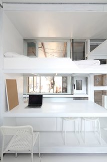 Humble Hostel was conceived by a group of young people who proposed temporary housing that could also give back space that's usually taken up by kitchen areas, bicycle parking, and other unnecessary items. 