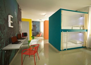 Accommodations at Hostel Emanuel are color-blocked with bright hues.