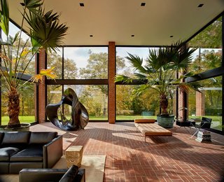 There's No Shortage of Glass in These 7 Homes Designed by Philip Johnson - Photo 6 of 7 - Designed by Philip Johnson for Eric Boissonnas and his family, this house was completed in 1956. Originally designed as a series of pavilions constructed of steel, brick, and glass, the home has since been updated by subsequent owners.