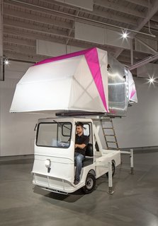 Eco-Friendly Prefabs and the Modern Mobile Home: Spotlight on Jennifer Siegal - Photo 7 of 14 - The AERO-Mobile is a movable, flexible exhibition and retail space made of recycled parts discarded by the aerospace industry. This impermanent architecture envisions buildings as a series of ULD’s (Unit Load Devices), up-cycled as exhibition space platforms and mounted on electric trucks—allowing for spontaneous pop-up experiences to be deployed throughout cities.