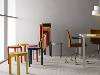 10 Functional Pieces For Small Space Living - Photo 2 of 11 - Perfect for small space entertaining, these lightweight Spin Stools can be stacked up and stored in a rainbow spiral.