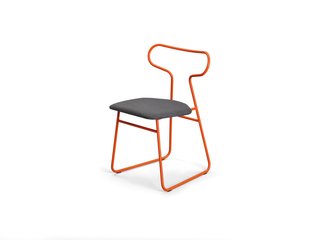 Color Unleashed - Photo 10 of 12 - Loop chair </p><p> Rodet, which has shaped tubular steel for nearly 40 years, likens the powder-coated lines of Fred Rieffel’s chair to the curves of a race track. rodet-home.net
