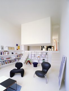 Gestalten's New Book Shows How to Transform Small Spaces Into Design Marvels - Photo 9 of 16 - The bedroom in this conversion of a former artist's studio is literally concealed in a white box suspended from the ceiling and located just off the living room. Designed by Emmanuel Combarel Dominique Marrec Architects, the bedroom is "like a hut in the middle of the flat."