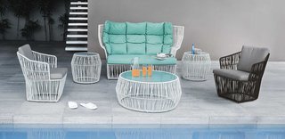 15 Modern Outdoor Seating Pieces To Take You Into Summer - Photo 5 of 5 - With an interesting shape made up of interwoven polyethylene strands on a tightened steel base, Kenneth Cobonpue's Calyx love seat is a comfortable conversation piece.