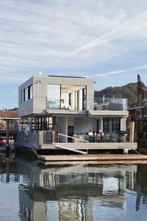 Water Sports - Photo 2 of 6 - Automatic retractable Sky-Frame windows open the living room completely on two sides. 
