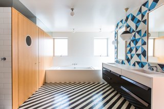 11 Examples of How to Incorporate Traditional Building Materials Into Your Modern Home - Photo 6 of 12 - Architect Barbara Bestor added a striped floor of Santander Granada Tile, Douglas fir cladding, and Granada Serengeti tile flipped to create a one-of-a-kind pattern on the wall.