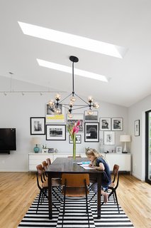 Minor Adjustments - Photo 3 of 7 - The dining area boasts circa-1955 Friso Kramer chairs. 