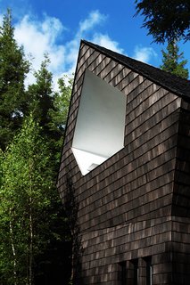Cedar shingles wrap the exterior.