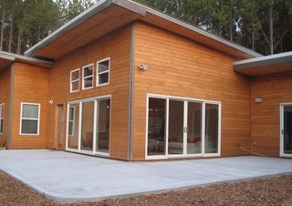 10 Kit Home Companies in the South - Photo 5 of 10 - Kokoon Homes's exclusive wall panel technology makes erecting your own house shell quick and easy. A fully custom shell kit is achieved with proprietary, universally-interchangeable wall panels from two to eight feet wide.