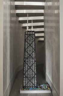 Child’s Play: Designing a Polished, All-Ages Playscape - Photo 6 of 8 - The space under the staircase houses a Lego version of the John Hancock Center by New York artist Sean Kenney. 