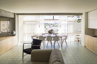 Lisbon Vision - Photo 2 of 5 - He also opted for light-colored materials, like seafoam-green cement tile by Projecto Mosaico and birch plywood millwork. 