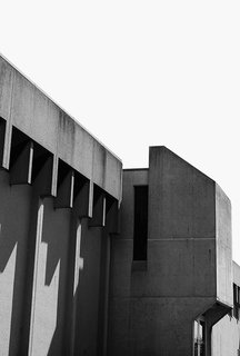 Ode to a Forward-Thinking America: Columbus, Indiana - Photo 8 of 18 - The fortress-like facade of Southside Elementary School, designed by architect Eliot Noyes in 1969 as a junior high school, features Brutalist, precast concrete panels and slotted windows. 