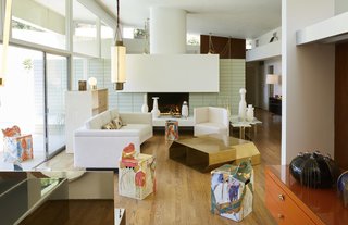 Casa Perfect Debuts Reinaldo Sanguino’s Vibrant Ceramics Inspired by ’90s Graffiti Culture - Photo 1 of 9 - The bright and airy gallery space—featuring a contemporary fireplace, sliding glass doors, and a backyard pool—serves as the perfect setting for Sanguino's work. 