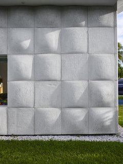 A Professor and Designer Tests a New Hybrid Material on His Miami Beach Home - Photo 1 of 11 - "For the majority of the day, when the sun is high, you almost don’t notice the texture on the exterior. It just fades into a flat wash," says designer Nick Gelpi of the undulating wood-based concrete tiles that clad his home in Miami Beach. "But at moments, the sun hits at a certain angle and really activates the surface."
