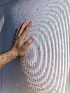 A Professor and Designer Tests a New Hybrid Material on His Miami Beach Home - Photo 4 of 11 - Rounded 24-inch-square tiles, which were custom cast by Architectural Art-Crete, cover most of the facade. 