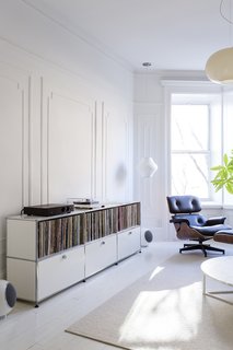 A Pair of Designers Renovate Their Brooklyn Brownstone With a Bright Monochromatic Palette - Photo 2 of 12 - To make the interior of their 12-foot-wide Brooklyn home feel larger, designers Ed Parker and Barbara Tutino Parker used Farrow & Ball paint in All White for the floors and applied Benjamin Moore Super White with a flat finish to the walls. They also rearranged the floor plan. 