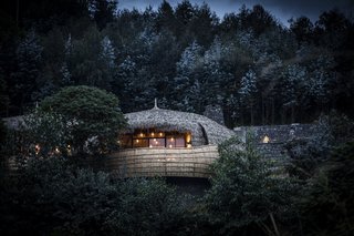 Take an Eco-Escape to a Spherical Forest Villa in an Eroded Volcanic Cone in Rwanda - Photo 1 of 10 - The forest villas were designed by South African architect Nick Plewman.