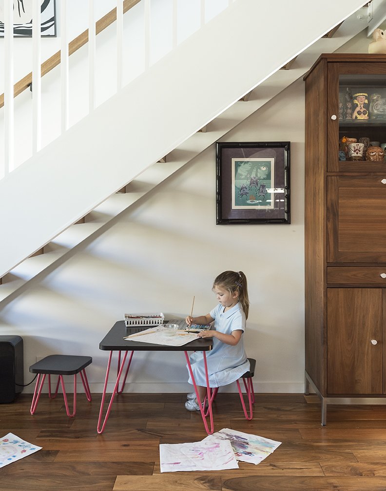 TJ and Jay&rsquo;s daughter, Chloe,  colors at an Ameriwood Home table  from AllModern.