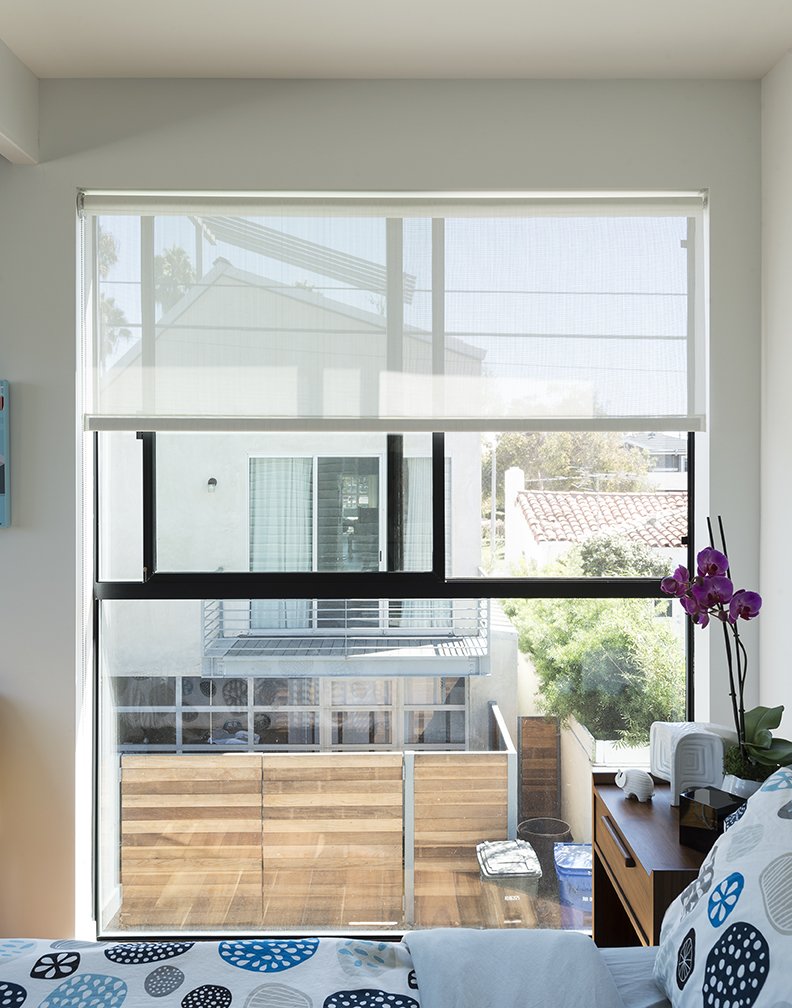 The master bedroom consists  of two modules set above a site-built garage. The fabric is from IKEA.