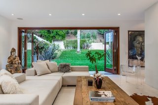 Experience L.A. Like an A-Lister at One of These Modern Short-Term Rentals - Photo 9 of 11 - This two-story remodeled villa in Beverly Hills will have you feeling like a star with its private gated entry and large front motor court. With an open-floor plan and a bright atmosphere, it offers a great indoor/outdoor connection. Although private and secluded, it's just steps from the heart of Beverly Hills and Rodeo Drive. 