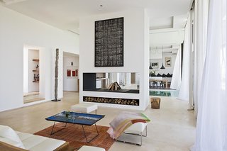 Stay in a Chic and Modern Moroccan Villa Near the Medina of Marrakech - Photo 3 of 11 - While the whole house is air conditioned, it also includes central heating and a fireplace for the colder months.